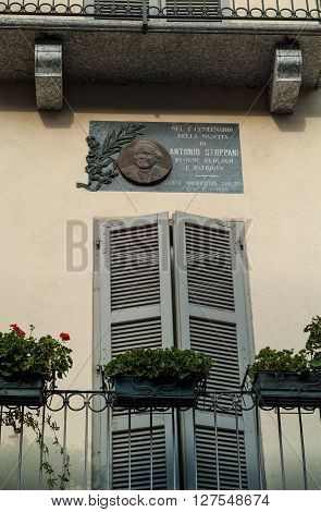 Lecco, Italy - September 1st 2015: photo of a memorial plate for Antonio Stoppani an Italian Catholic priest geologist and palaeontologist. Photographed in Lecco Italy on September 1st 2015.