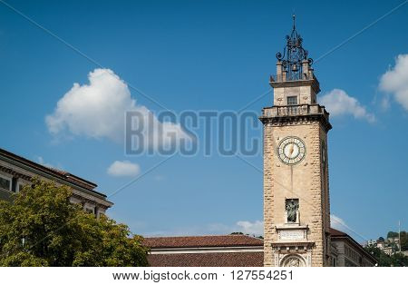 Bergamo, Italy - September 9th 2015: bell tower monument dedicated to the victims of WW1 (Caduti I Guerra Mondiale 1915 - 1918) in Bergamo Italy. The text says approx. "To the glorious ones who fell Bergamo recognizes"