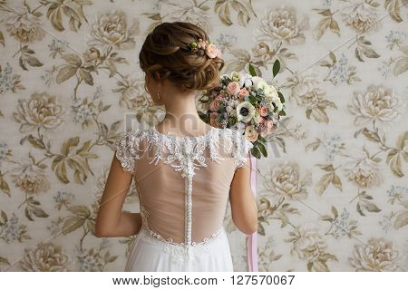Morning beautiful bride. Vintage background. Wedding bouquet