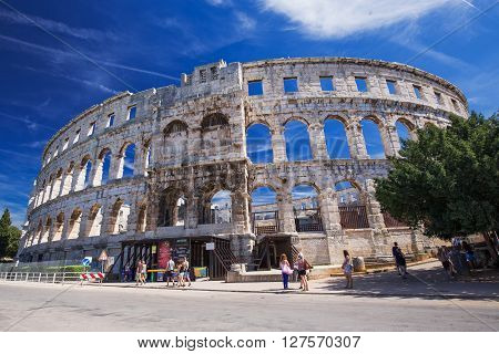 PULA, CROATIA - August 30, 2014 - Ancient Roman Amphitheater and Church in Pula, Istria, Croatia