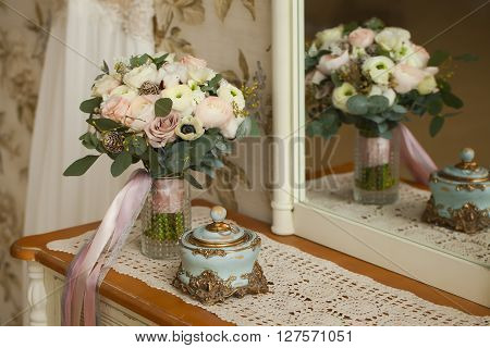 Wedding decoration. Vintage background, accessories. Wedding bouquet. Morning bride. Wedding rings.