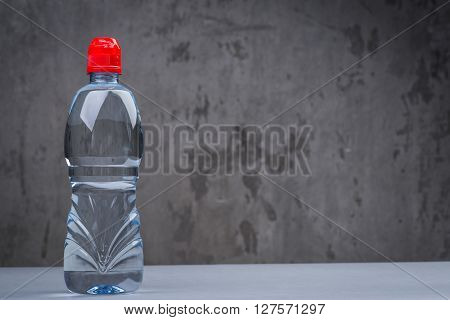 A Bottle Of Diet Pills With Measuring Tape