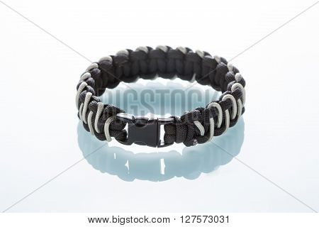 braided bracelet on white background.  synthetic cord