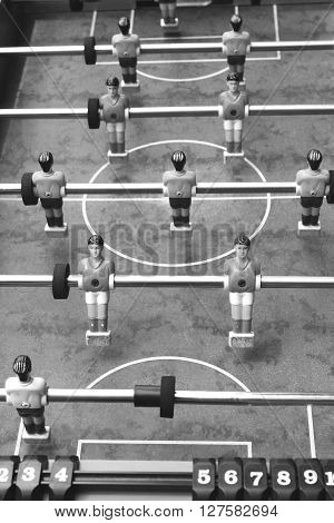 Vintage foosball, black and white photo, retro style