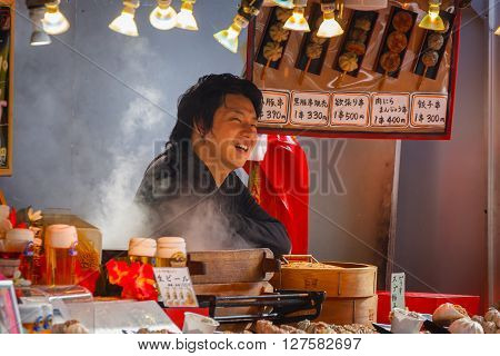 YOKOHAMA JAPAN - NOVEMBER 24 2015: Chinese food vendor on the side of streets of Yokohama Chinatown