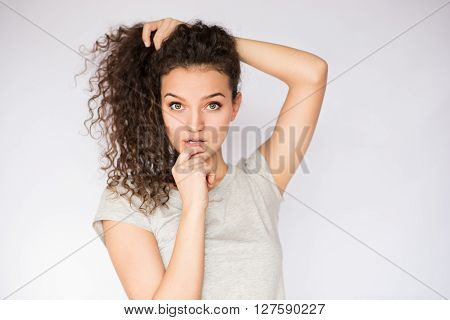 smile happy woman young curls on white background.