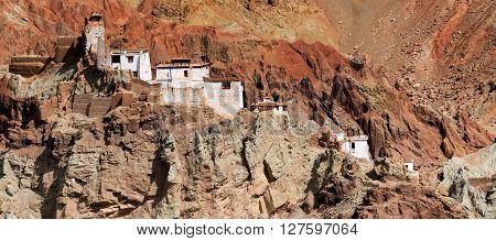 Ruins and Basgo Monastery surrounded with stones and rocks Leh Ladakh Jammu and Kashmir India. Panoramic image.