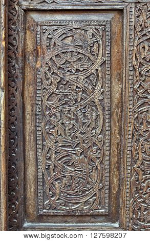 Close-up of a traditional carved wooden door, Uzbekistan