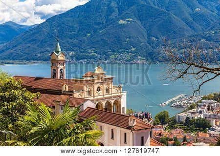 View of Madonna del Sasso Church above Locarno city and the Maggiore lake in Ticino Switzerland