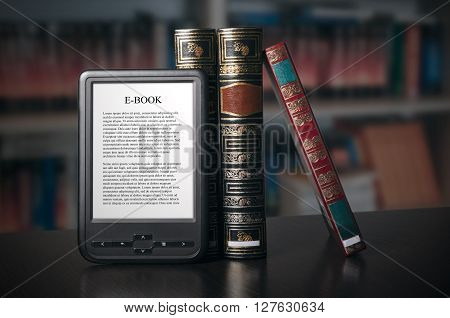 E-book Reader Device On Desk In Library