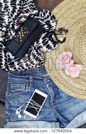 Top view of girly outfit with fashionable details