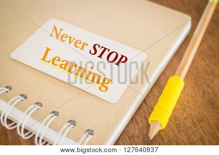 Never stop learning. Motivational quote about education stock photo
