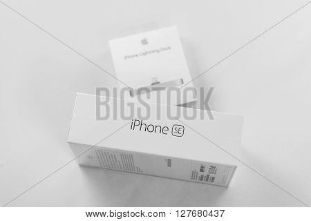 PARIS FRANCE - APR 21 2016: Packaging box of the new Apple iPhone SE combining the updated processor 4K rear camera touch id retina display and new Docking Station for iphone