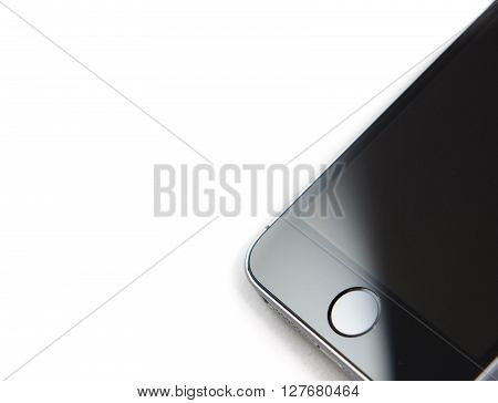 PARIS FRANCE - APR 21 2016: Touch ID an of the new Apple iPhone SE combining the updated processor 4K rear camera touch id retina display
