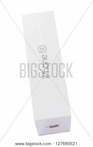 PARIS FRANCE - APR 21 2016: Side view of the packaging box of the new Apple iPhone SE combining the updated processor 4K rear camera touch id retina display