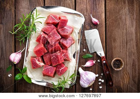 raw beef meat on a wooden table