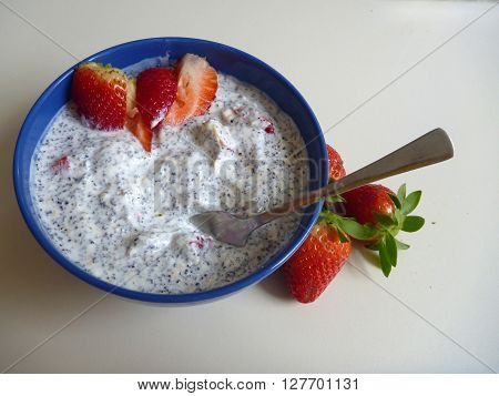 Bowl Of A Yoghurt With Strawberries