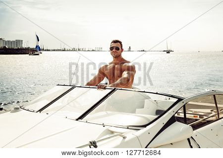 Muscle Man On A Boat