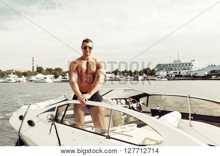 Muscle Man On A Boat