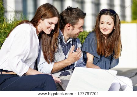 Student group working together outside and having fun