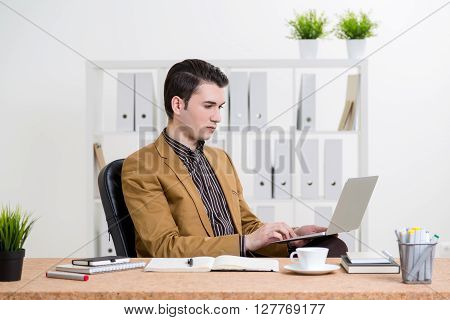 Caucasian Businessman Using Laptop