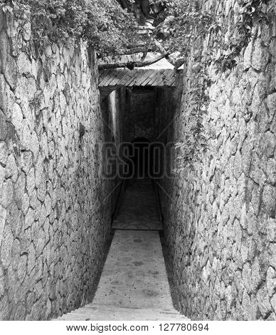 Door to catacombs with a scary end.