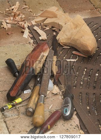 Tools lay ready to finish the work of a carver in a market in Falmouth Jamacia