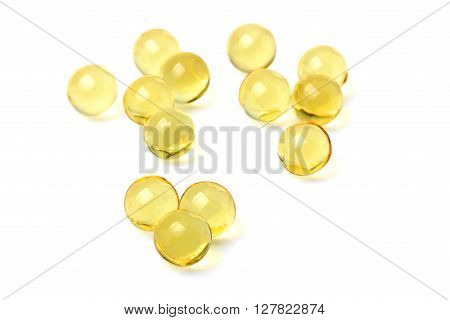 Fish oil capsules isolated on white background.
