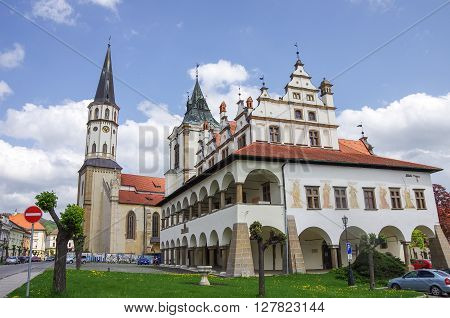 Levoca, Slovakia - May 10, 2013: Old town hall and St. Jacob's Church in the main square of UNESCO listed medieval town of Levoca in eastern Slovakia.