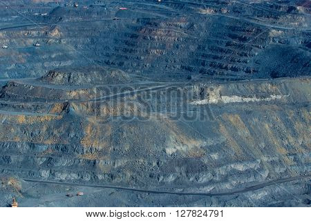 rock formations in the vast quarries of ore together with the technique