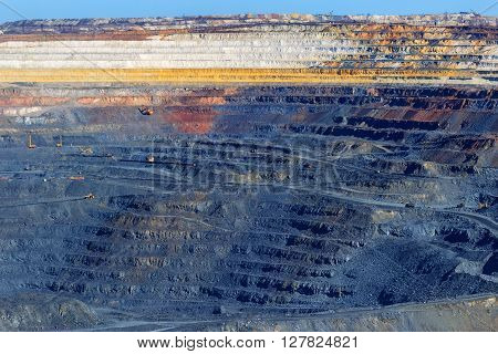 rock formations in the vast quarries of ore together with the technique