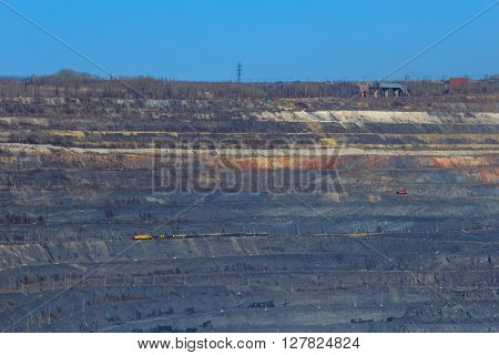 rock formations in the vast quarries of ore together with the technique