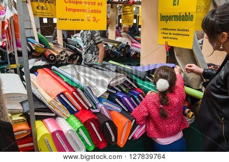 Family Buying Textile Items