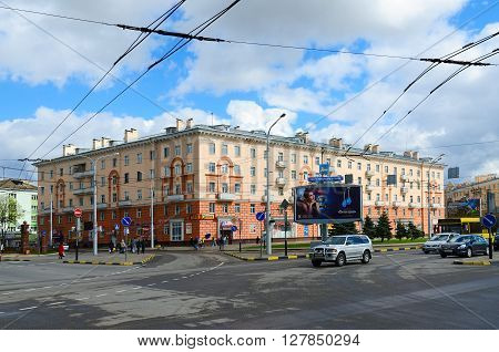 GOMEL BELARUS - APRIL 23 2016: Unidentified people walk down the street near shopping center "Start" Gomel Belarus