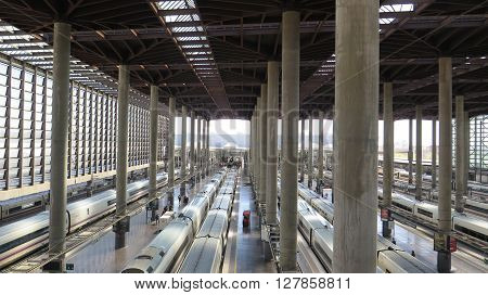 Madrid Spain April 7 2016: Top view of Madrid Atocha Railway station with train and platform. Madrid Spain April 7 2016