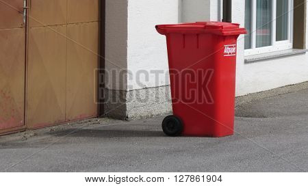 WIEN AUSTRIA - CIRCA APRIL 2016: Altpapier (meaning Old paper or waste paper) red waste container