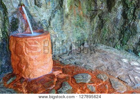 Detail of the mineral water spring - ferruginous water
