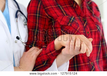Woman Doctor Hands Holding Female Child Patient Hand