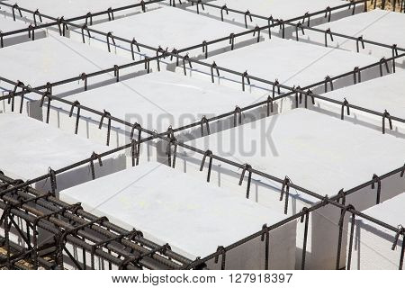 Iron framework and polyurethane  to build a foundation for a building