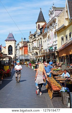 Valkenburg Netherlands - April 11 2016: city view with restaurants and unidentified people in the old town of Valkenburg. Valkenburg aan de Geul in the province Limburg is a popular tourist destination