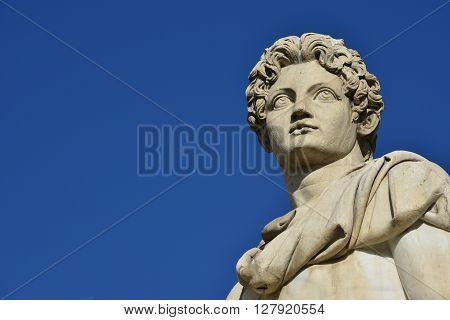 Marble head from the ancient roman statue of Dioskouri at the top of Capitoline Hill staircase and balustrade in the center of Rome (1st century BC)