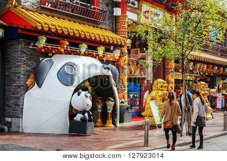 YOKOHAMA JAPAN - NOVEMBER 24 2015: Yokohama Chinatown is Japan's largest chinatown. A large number of Chinese stores and restaurants can be found in the narrow and colorful streets