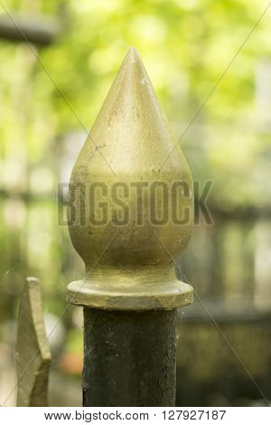 Decorative ornament made of old metal on the fence