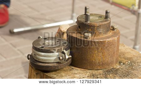 tool on a wooden deck for minting coins souvenir nature