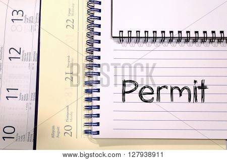 Permit text concept write on notebook .