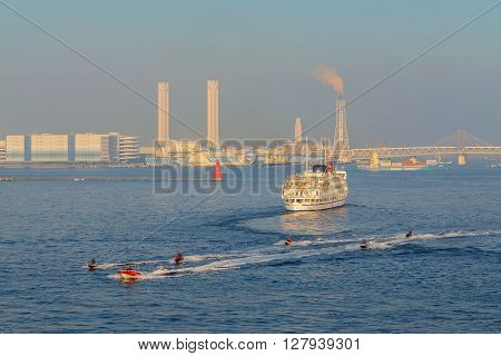 YOKOHAMA JAPAN - NOVEMBER 24 2015: Yokohama Port has 10 major piers. In 2013 the Port served 37706 ships. It handled 271276977 tons of cargo and 2888220 TEU containers