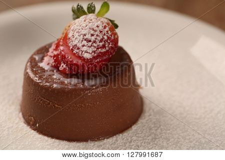 Chocolate mousse with red fruits. Gourmet dessert.