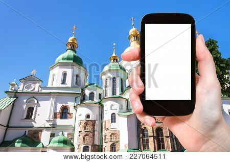 Travel Concept - Tourist Photographs Saint Sophia (holy Sophia) Cathedral In Kiev City In Ukraine On