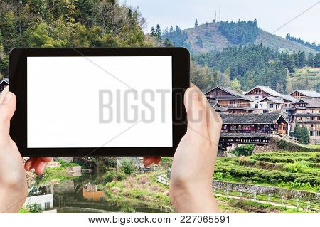 Travel Concept - Tourist Photographs Country Houses And Wind And Rain (fengyu) Bridge In Chengyang V