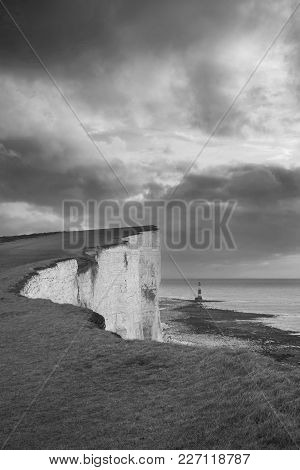 Stunning Black And White Landscape Image Of Beachy Headt Lighthouse On South Downs National Park Dur